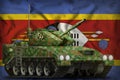 Light tank apc with summer camouflage on the Swaziland national flag background. 3d Illustration