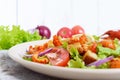 Light tasty salad with meat of a cancer, shrimps, lettuce, garlic croutons, tomatoes Royalty Free Stock Photo