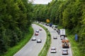 A light traffic jam with rows of cars. Traffic on the highway.