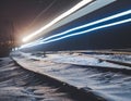 Light trail from the train while moving at night in winter Royalty Free Stock Photo