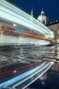 Light trail of tram passing between historical buildings Royalty Free Stock Photo