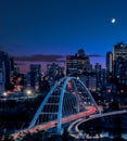 Light trails as traffic goes across the new bridge during blue hour in Edmonton YEG, Alberta , Canada