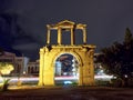 Light trails behind Hadrian Arch at night, Athens, Greece Royalty Free Stock Photo