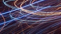 Light trails in blue and orange tones creating a swirling pattern Royalty Free Stock Photo