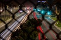 Light trails of busy traffic on Pacific Coast Highway in Downtown Huntington Beach, CA Royalty Free Stock Photo