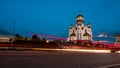 Light trails on the city street after sunset. Church of All Saints Yekaterinburg