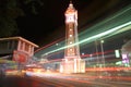 Light trails at clock tower in Nonthaburi Royalty Free Stock Photo