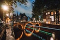 Light trails at famous canals in Amsterdam at dusk. Long exposure shot Royalty Free Stock Photo