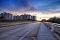 Light trails on the Overpass of Bluebill Avenue leading toward Delnor Wiggins State Park at sunset