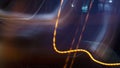 Light trails from panning on the streets at night Royalty Free Stock Photo
