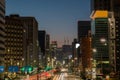 Light trails on the street at dusk in sakae,nagoya city. Royalty Free Stock Photo