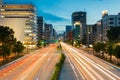 Light trails on the street at dusk in sakae,nagoya japan. Royalty Free Stock Photo