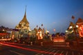 Light trails on street near Traimit temple at dusk