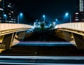 Light trails of traffic passing under the underpass in Eindhoven, with copy space. Royalty Free Stock Photo