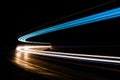 Light trails in tunnel. Art image. Long exposure photo taken in