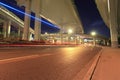 Light trails under city highway viaduct