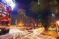 Light trails from vehicle traffic streak across a busy intersect Royalty Free Stock Photo