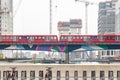 Light train passing through Canary Wharf in London