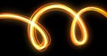 Light wave spiral trail effect, orange neon glow spin twirl trace. Incandescent spiral line and magic fire light glow swirl in Royalty Free Stock Photo