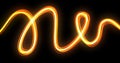 Light wave trail effect with neon glow spiral trace path, yellow and orange golden bright glowing flash flare. Optic fiber line Royalty Free Stock Photo