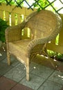 Light wicker rattan chair in the garden gazebo