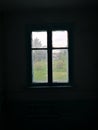 And only the light in the window in a dark room Royalty Free Stock Photo