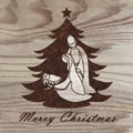 Christmas tree with nativity scene engraved on wood with pyrography technique. Hobby. DIY. Do it yourserlf