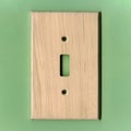 Light Wood Switch Plate Royalty Free Stock Photo