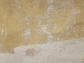 Light yellow beige gunge old wall texture painted cement structure rusty cracked