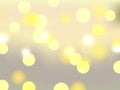 Light yellow bokeh lights. Blurred bright abstract bokeh on color background. Festive defocused lights. Royalty Free Stock Photo
