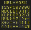 Light yellow digital font, letters and numbers. English alphabet in digital screen. LED board concept for billboards, airport, Royalty Free Stock Photo