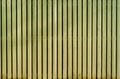 Light yellow old wooden painted fence Royalty Free Stock Photo