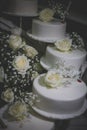 Yellow roses on white wedding cakes Royalty Free Stock Photo