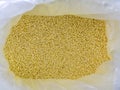 Light yellow small round granules are chemical fertilizers calcium nitrate