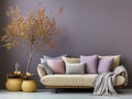 Light yellow sofa with pastel colorful cushions against violet wall with copy space. Scandinavian interior design of modern living