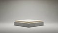 Simple Square Product Display Platform with Subtle Backlighting and a Cream Colored Surface on a Neutral Gray Background Keywords Royalty Free Stock Photo