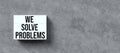 Lightbox with message WE SOLVE PROBLEMS - 3D rendered illustration