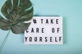 Lightbox with motivational words for self-care, mental health, emotional well-being. Top view Royalty Free Stock Photo