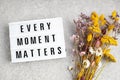 Lightbox with text every moment matters. Mental health, positive thinking idea