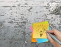 Lightbulb as creative on crumpled sticky note
