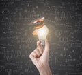 Lightbulb education brainstorming on business hand with creative Royalty Free Stock Photo