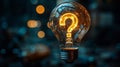Lightbulb with glowing question mark in a dark room Royalty Free Stock Photo