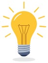 Lightbulb Glowing with Radiating Light Rays Illustrating Bright Idea or Innovation Royalty Free Stock Photo
