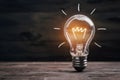 Lightbulb idea concept enlightenment and innovation concept photo, symbolizing creative inspiration Royalty Free Stock Photo