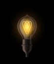 Lightbulb realistic. Design electricity light lamp, bright yellow glowing decor 3d single element isolated on black dark Royalty Free Stock Photo