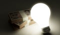 Lightbulb with stack of money Royalty Free Stock Photo