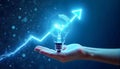 Lightbulb with Upward Arrow Held in Hands on Dark Background Suggesting Growth Royalty Free Stock Photo