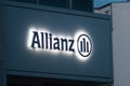 Lighted Allianz logo and sign in Berlin. Allianz is a European financial services company headquartered in Munich, Germany.