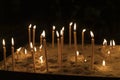 Lighted candles in church with nice light and bokeh Royalty Free Stock Photo
