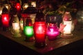 Lighted candles on the grave at All Saints` Day Royalty Free Stock Photo